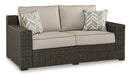 Coastline Bay Outdoor Loveseat with Cushion - Aras Mattress And Furniture(Las Vegas, NV)