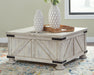 Carynhurst Coffee Table - Aras Mattress And Furniture(Las Vegas, NV)