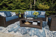 Windglow Outdoor Loveseat with Cushion - Aras Mattress And Furniture(Las Vegas, NV)